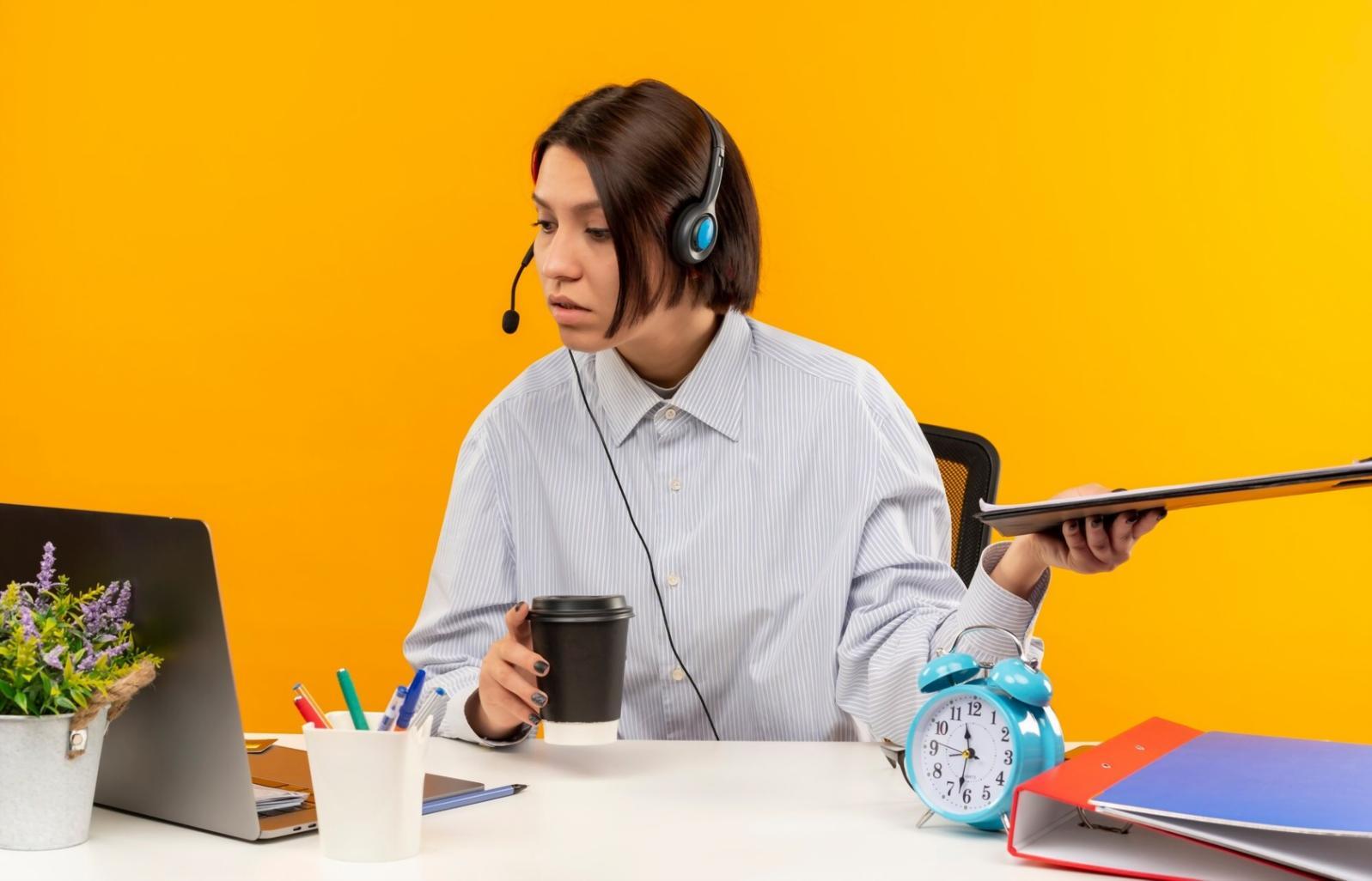 Financial analyst reviewing complex modeling framework on multiple screens