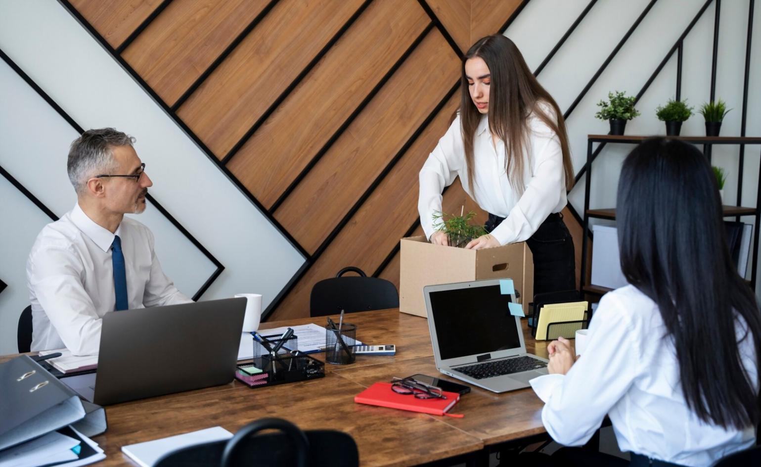 Financial analyst reviewing complex modeling frameworks on multiple displays